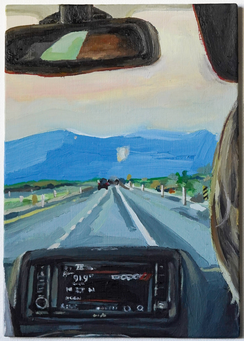 Painting of a car interior with a road ahead. 91.9 Radio station with the road ahead